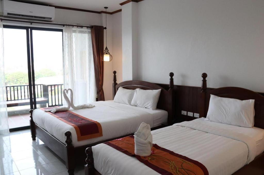Thavisouk Riverside Hotel Vang Vieng Esterno foto